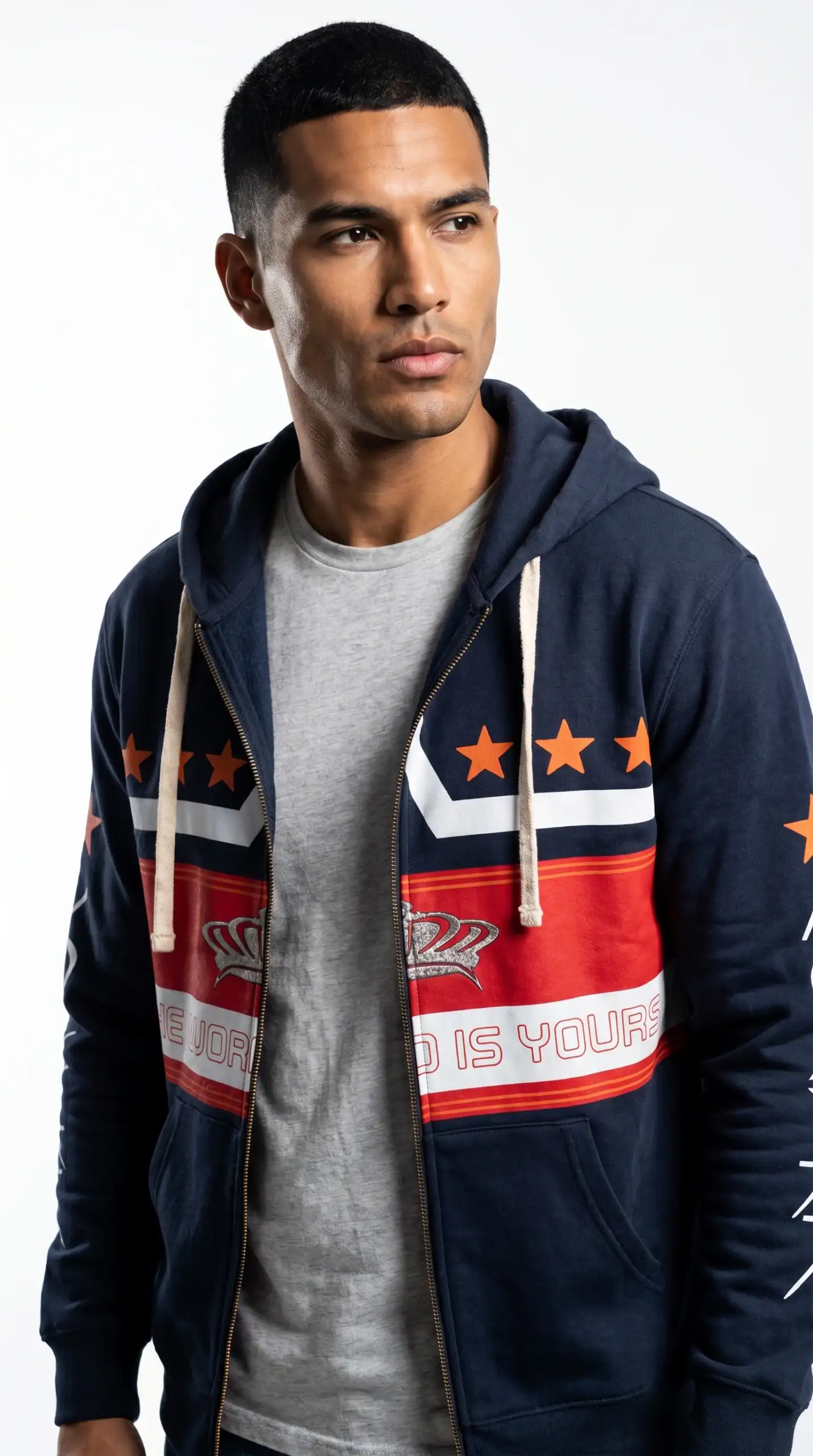 Young man wearing a navy blue hoodie with red and white graphic design, casual urban style.