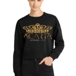 A person with short blond hair wears the Leopard Print Women’s Perfect Weight Fleece Cropped Crew, featuring a black design with a leopard print crown and ACARTA APPAREL CO text, standing against a white background with one hand in their pocket.