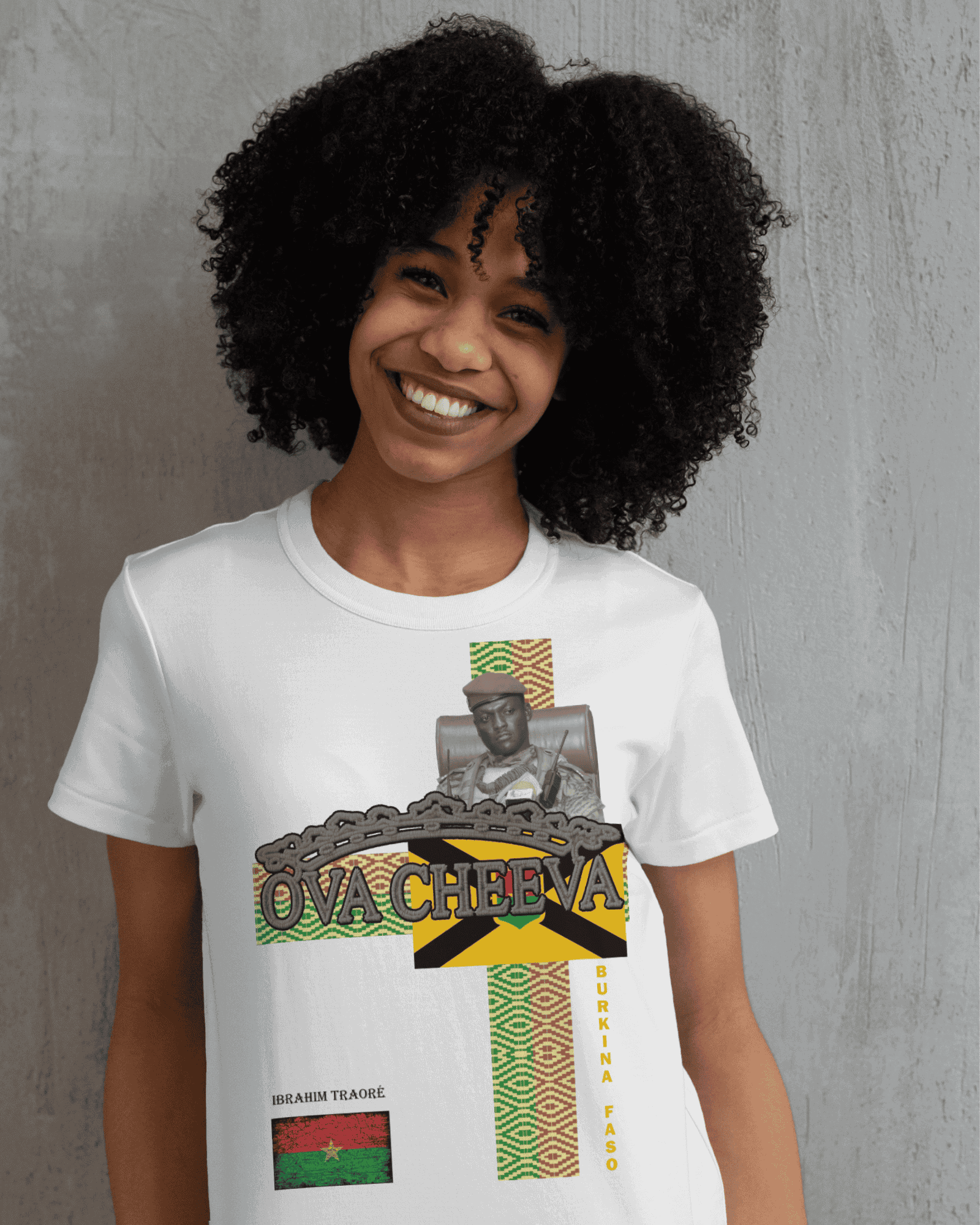 Smiling woman wearing white T-shirt with Ibrahim Traoré graphic and colorful design.
