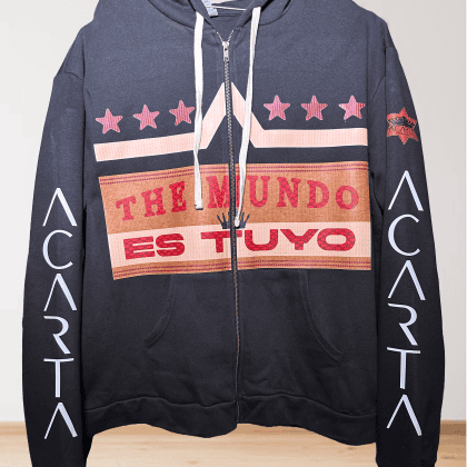 Black hoodie with "THE MUNDO ES TUYO" text and star designs on front.