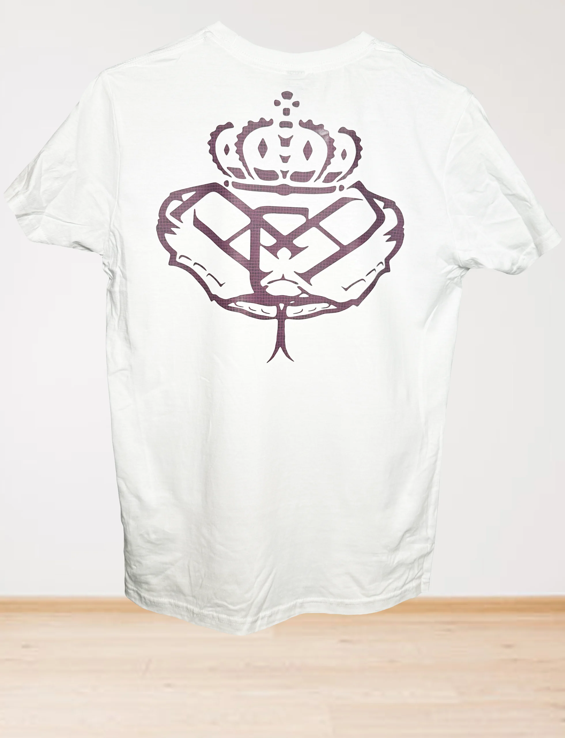 The Womens Midweight Cotton Revolution Line T-Shirt features a large dark brown crown-over-book graphic on the back against a white fabric, shown on a simple light background.
