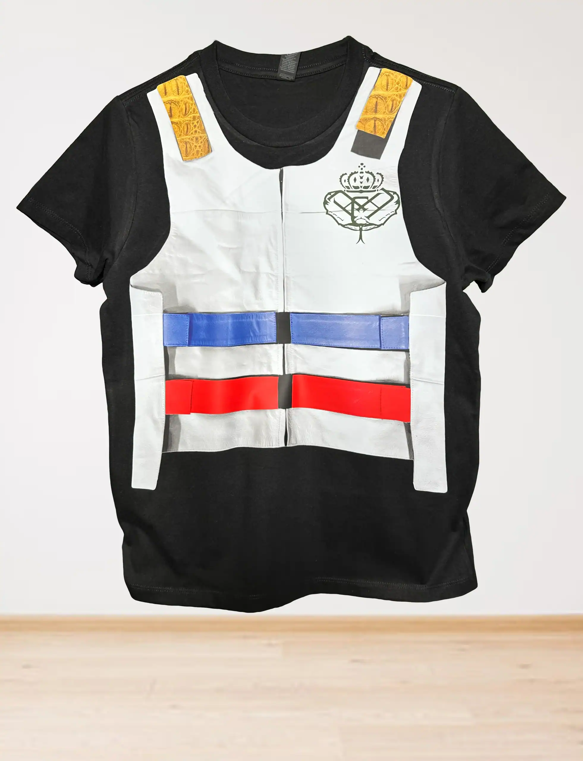 A black t-shirt printed with a design resembling a police or security vest, featuring white panels, red and blue horizontal stripes, yellow shoulder details, and a crown emblem on the chest.